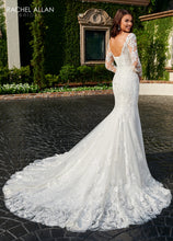 Load image into Gallery viewer, A young woman in a mermaid style bridal gown in the color ivory nude
