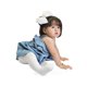 Load image into Gallery viewer, A baby wearing white tights, a blue dress, and a white bow in her hair.
