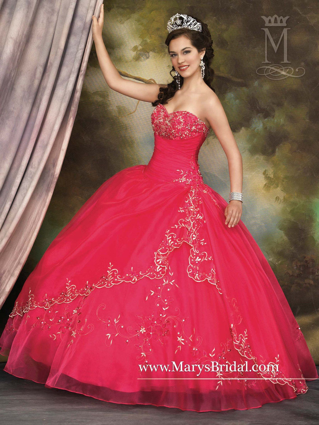 A young lady wearing a strapless princess ballgown in the color azalea/multi 