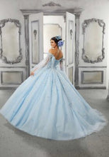 Load image into Gallery viewer, The back view of a young lady wearing a ballgown with cape in the color light blue.
